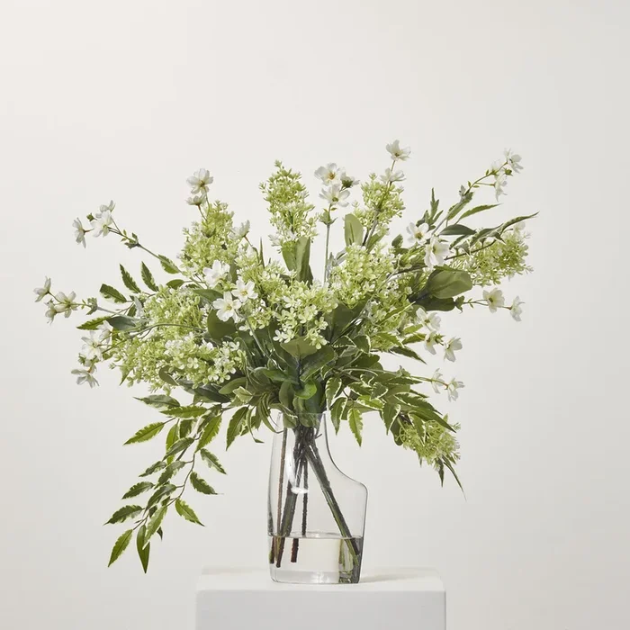 Modern Whites – Seeding Bloom Hydrangea, White Mini Cosmos & Variegated Smilax Leaf Everyday Spring Water Illusion Arrangement